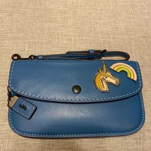 1942 Clutch in Lake with customized pins.
